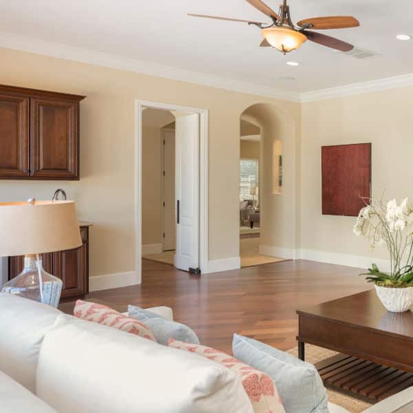Residential construction services create a beautiful living room with hardwood floors.